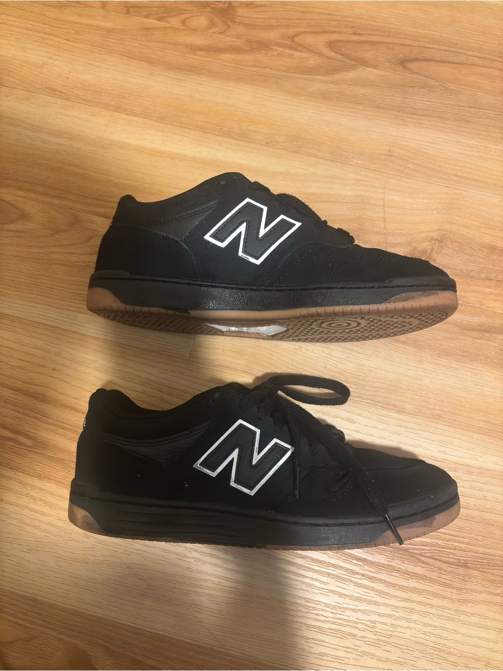 New Balance Black Men’s Low-Top Sneakers with White Logo